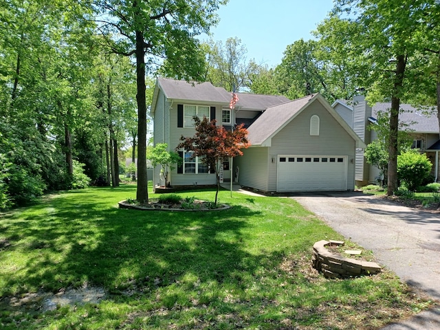 view of front facade featuring a front yard and a garage