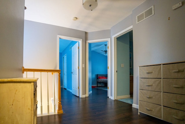 hall with dark hardwood / wood-style floors