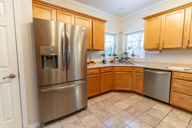 kitchen with crown molding, sink, and stainless steel appliances