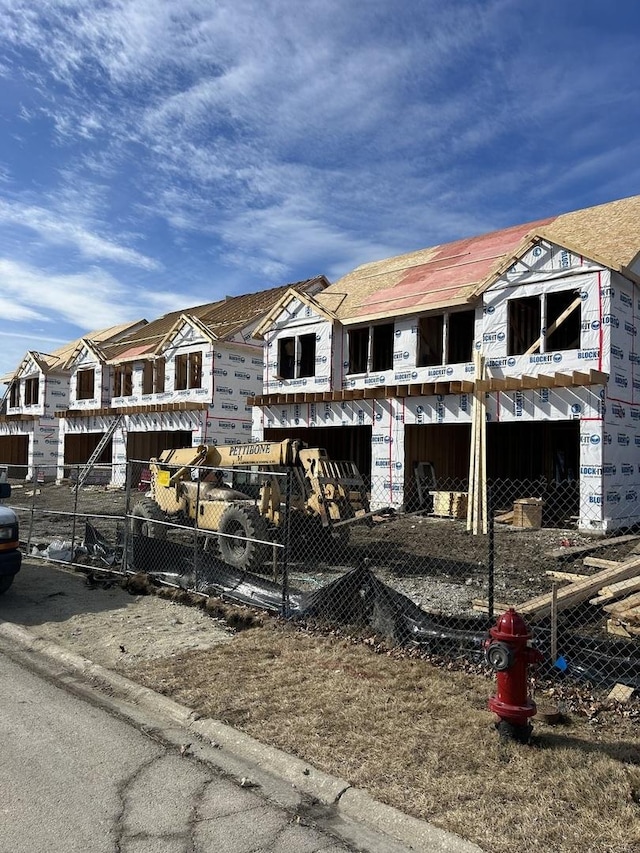 property under construction with fence