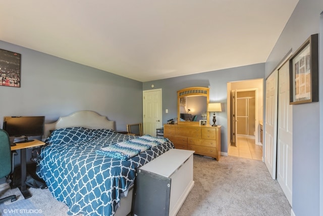 carpeted bedroom featuring a closet