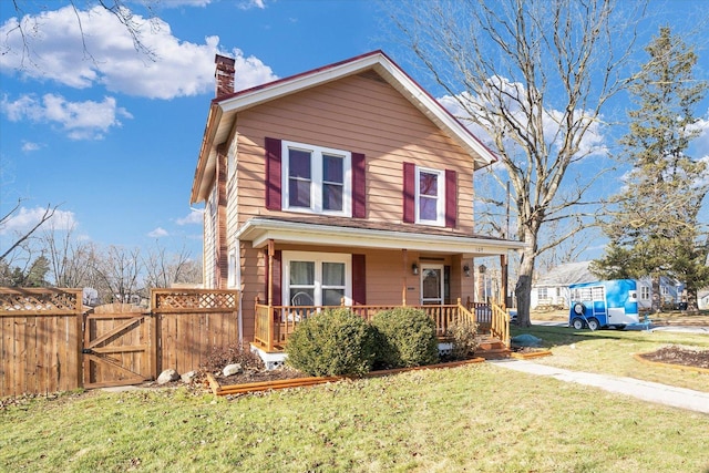 view of front property with a porch and a front lawn