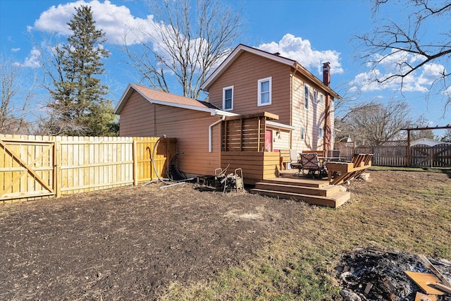 rear view of house with a deck