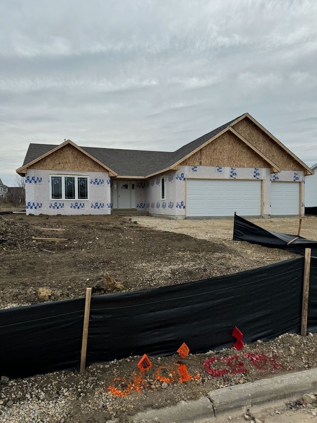 property under construction featuring a garage