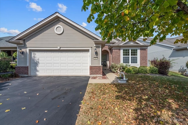 single story home with a garage