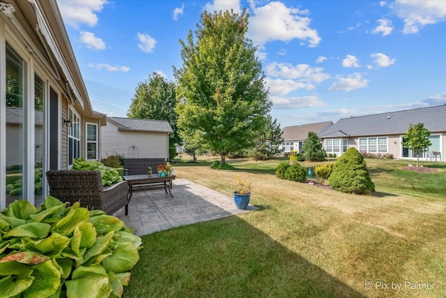 view of yard with a patio area