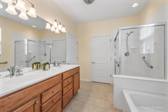 bathroom featuring tile patterned floors, vanity, and separate shower and tub