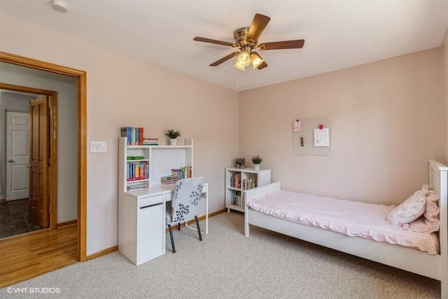 carpeted bedroom with ceiling fan