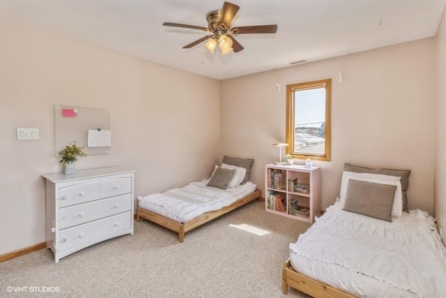 bedroom with light colored carpet and ceiling fan