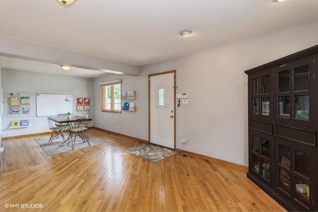 entrance foyer with light wood-type flooring