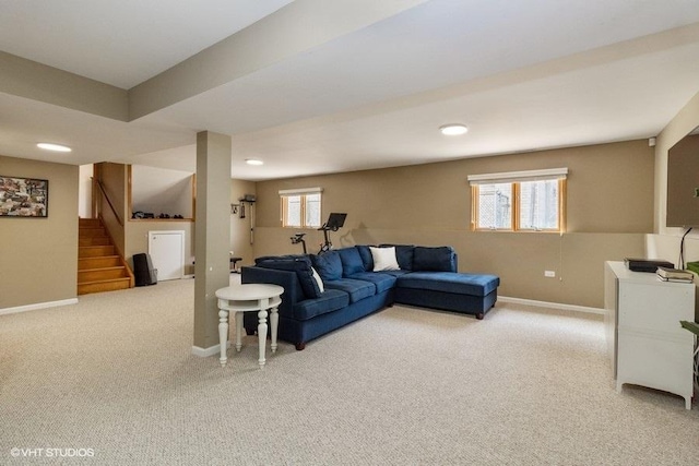 living room featuring light carpet