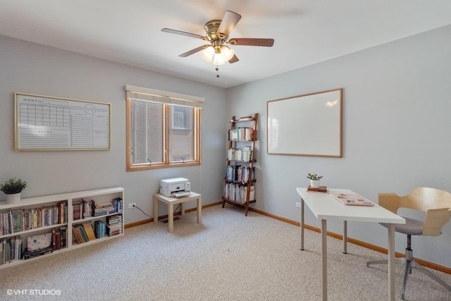 office area with light colored carpet and ceiling fan