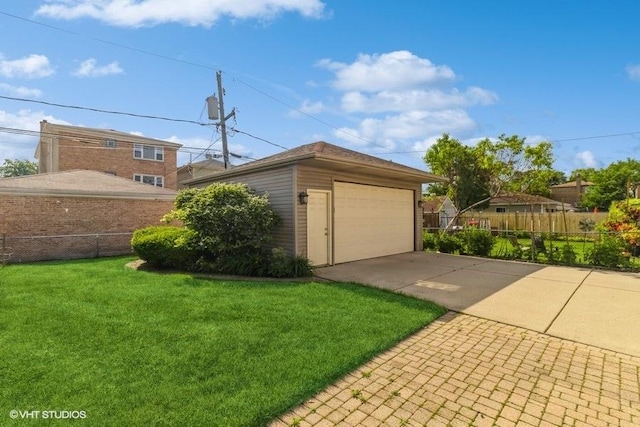 garage with a yard