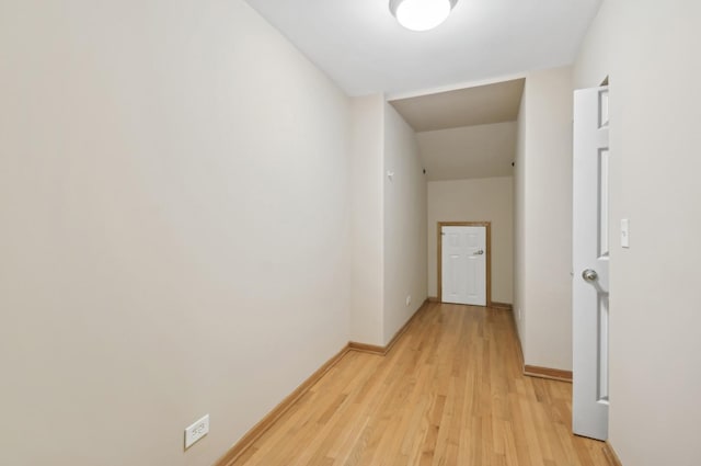 hallway with light wood-type flooring