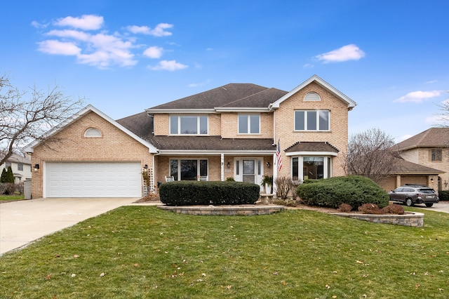 front facade featuring a garage and a front lawn