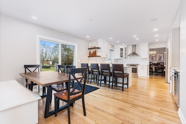 dining room featuring light hardwood / wood-style floors