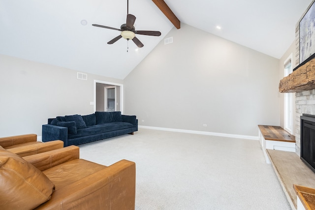 living room with carpet flooring, beam ceiling, high vaulted ceiling, and ceiling fan