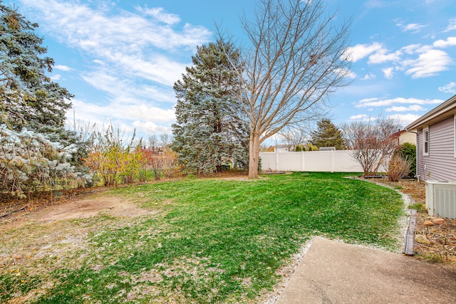 view of yard with central AC