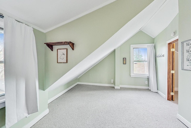 bonus room featuring carpet flooring and lofted ceiling