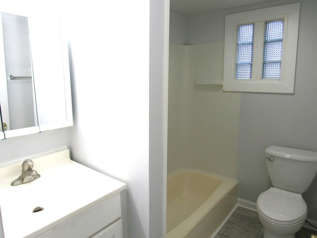 full bathroom with shower / tub combination, vanity, and toilet