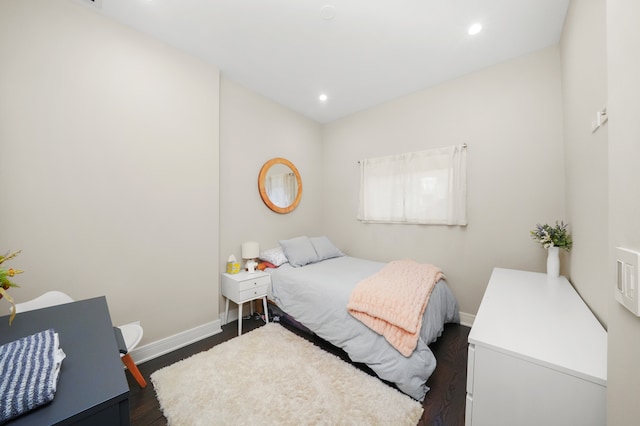 bedroom featuring dark hardwood / wood-style floors