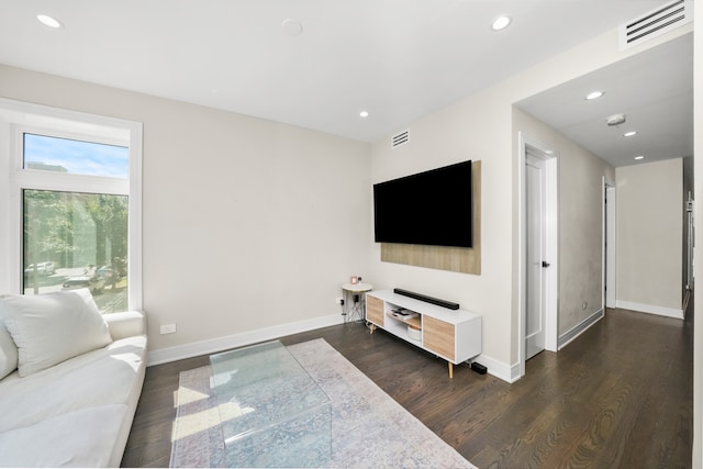 living room featuring dark hardwood / wood-style floors