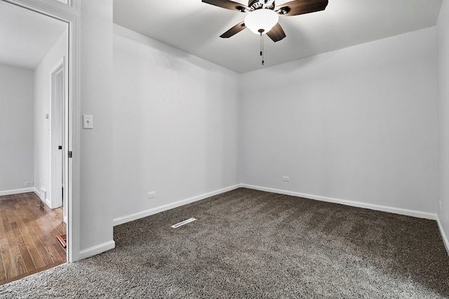 spare room with hardwood / wood-style flooring and ceiling fan