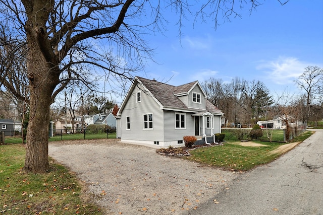 view of home's exterior with a yard