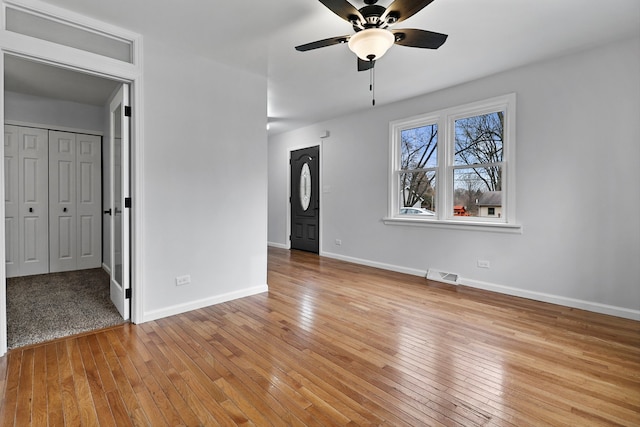 interior space featuring ceiling fan and light wood-type flooring