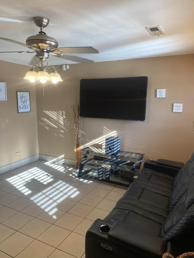 tiled living room with ceiling fan