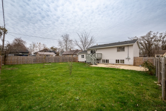 view of yard with a patio area