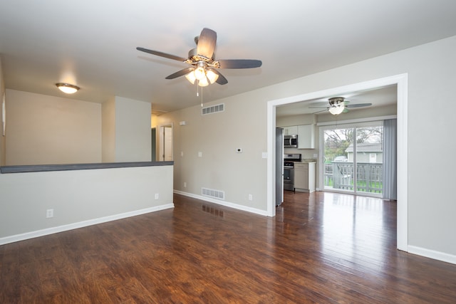 unfurnished living room with ceiling fan and dark wood-type flooring