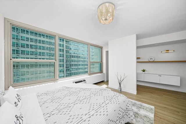 unfurnished bedroom featuring hardwood / wood-style flooring