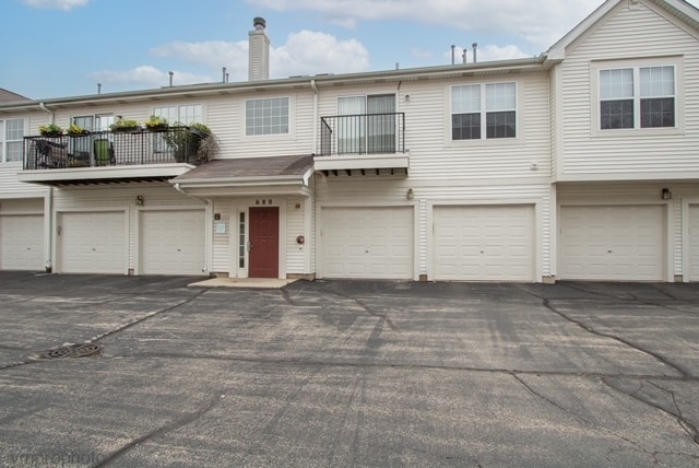 view of property with a balcony