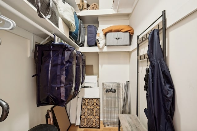 walk in closet featuring hardwood / wood-style flooring