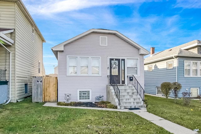 view of front of property with a front yard