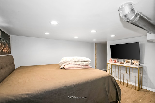 bedroom featuring light wood-type flooring