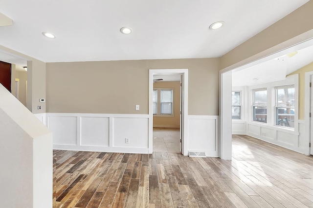 empty room featuring hardwood / wood-style floors