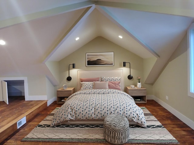 bedroom with vaulted ceiling, dark wood-type flooring, visible vents, and baseboards