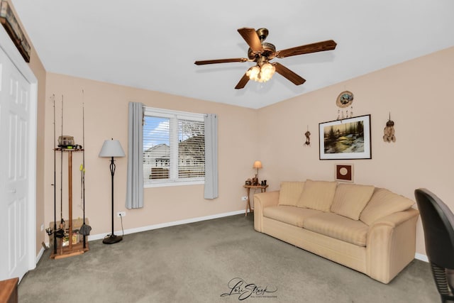 living room featuring ceiling fan and carpet flooring