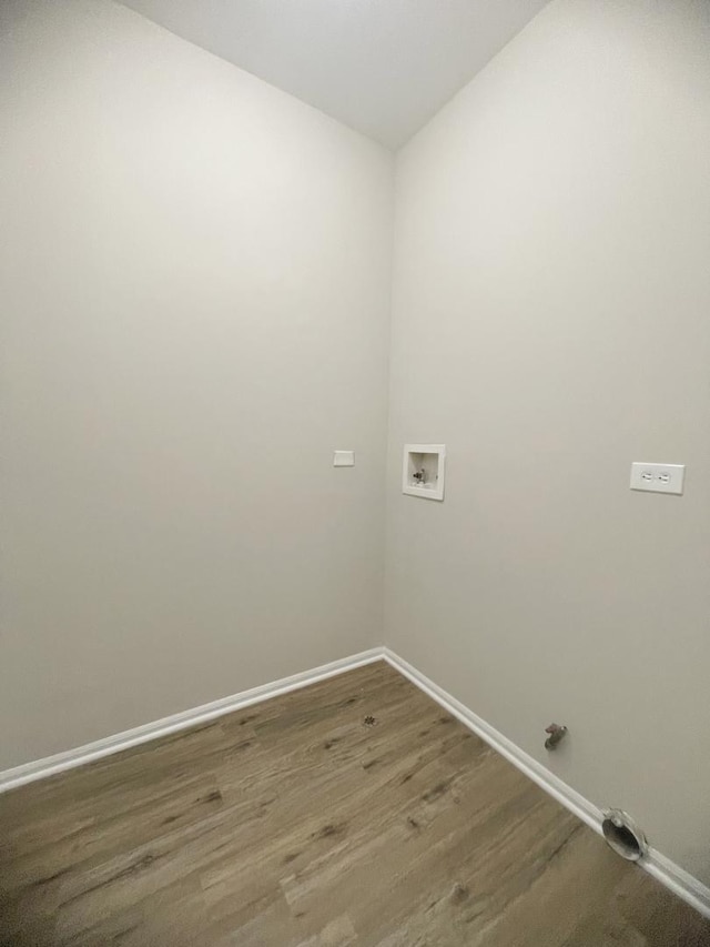 washroom featuring washer hookup and hardwood / wood-style flooring