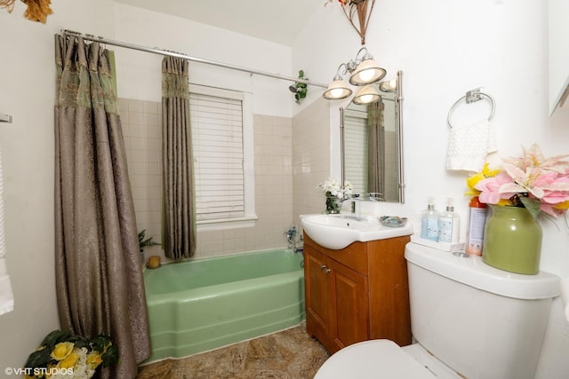 full bathroom featuring vanity, shower / bathtub combination with curtain, and toilet