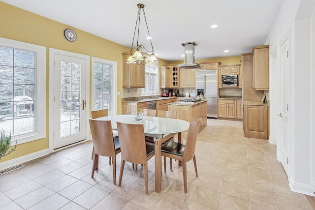 dining space featuring light tile patterned floors, recessed lighting, visible vents, and baseboards