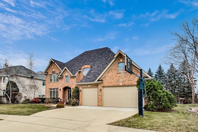 view of front of home with driveway, a front lawn, and brick siding