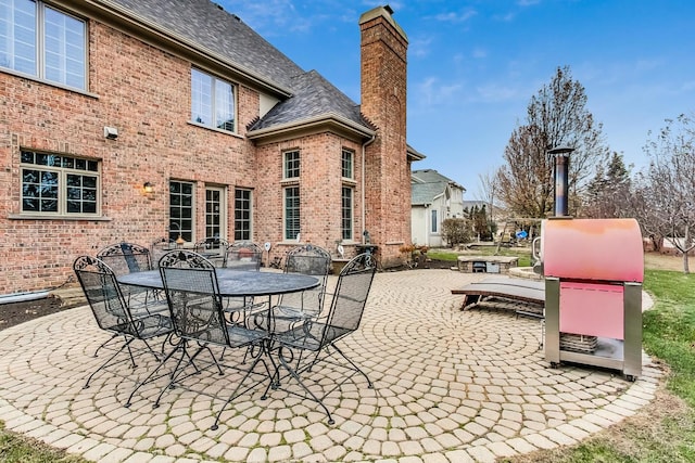 view of patio featuring outdoor dining space