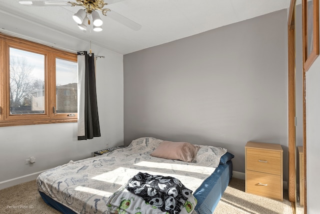 bedroom with carpet floors and ceiling fan