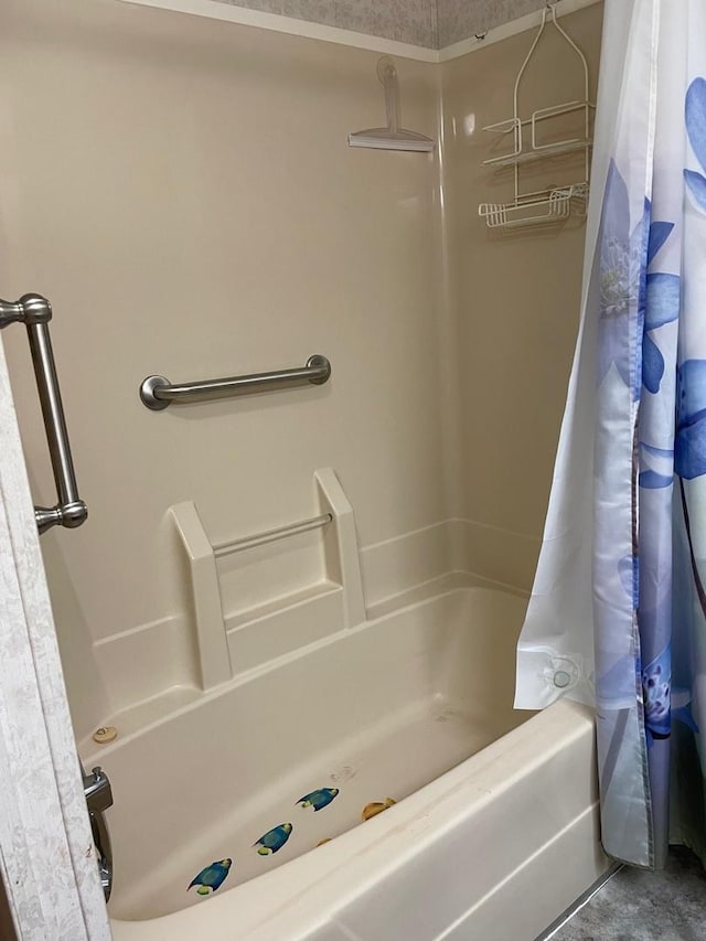 bathroom featuring shower / bath combo with shower curtain