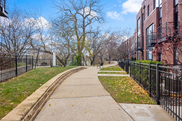 surrounding community featuring a yard