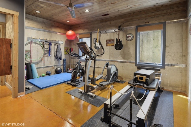 exercise room featuring ceiling fan and wood ceiling