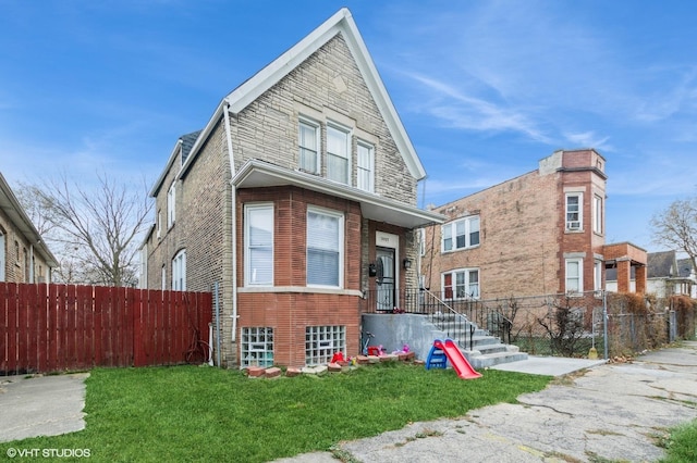 view of front of house with a front lawn